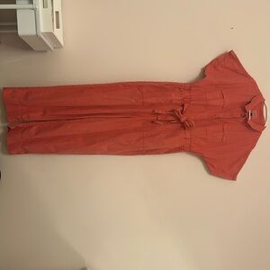 perfect jumpsuit for fall with a cute bow detail in the front